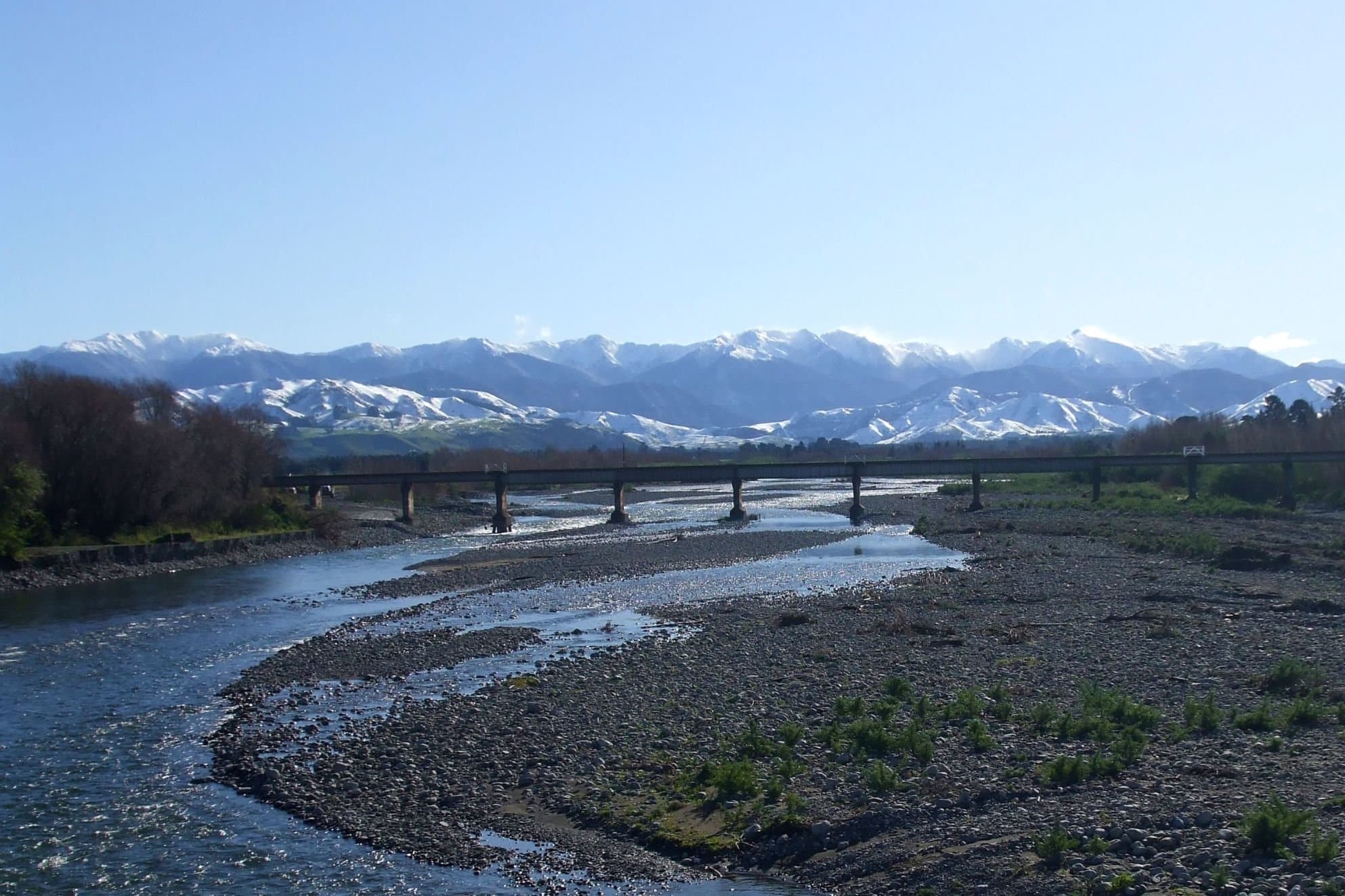 Image of lake bridge and mountains
