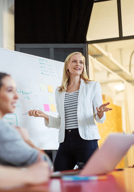 Image of people meeting and presenting