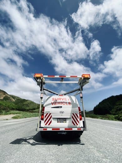 Image of rear of Woods survey van