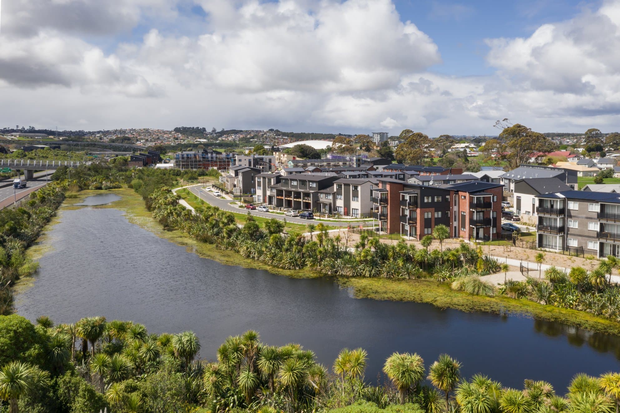 Image of Barrowcliffe drone of pond and apartments