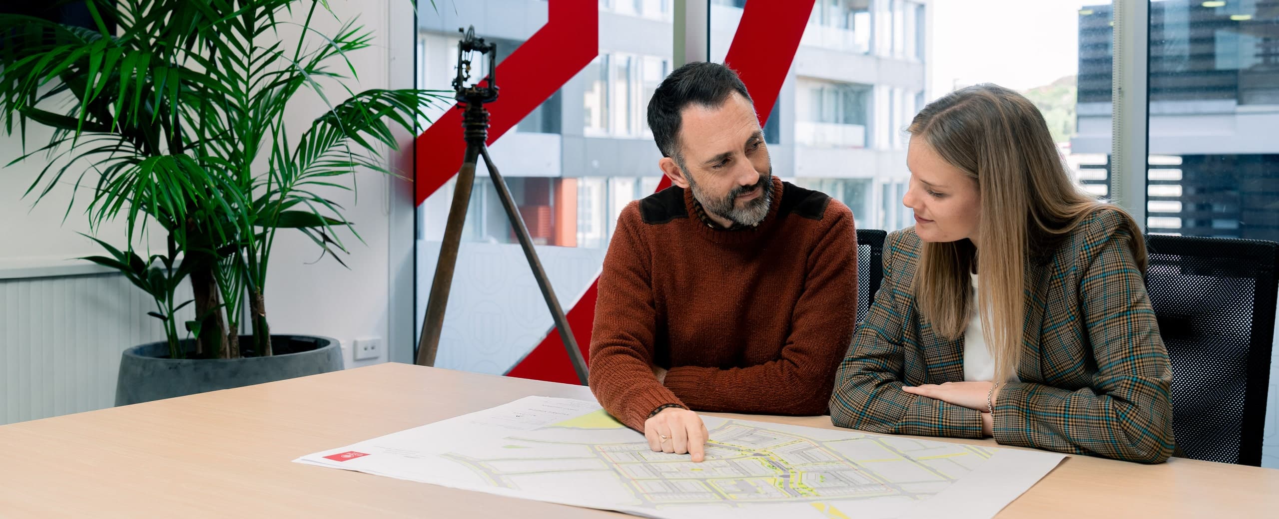 woods team loooking at masterplanning map