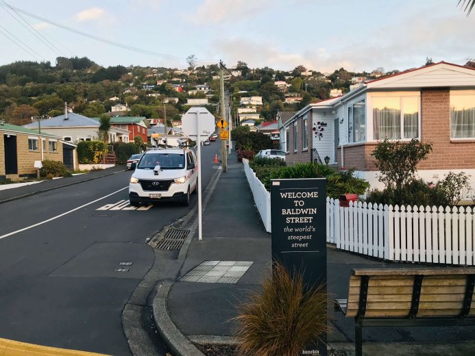 Testing vehicle in suburban street