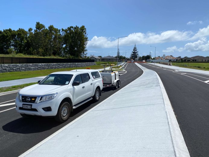 Testing vehicle on new highway shoulder