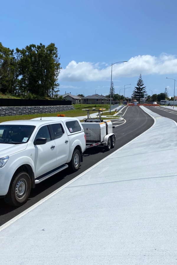 Testing vehicle on new highway shoulder